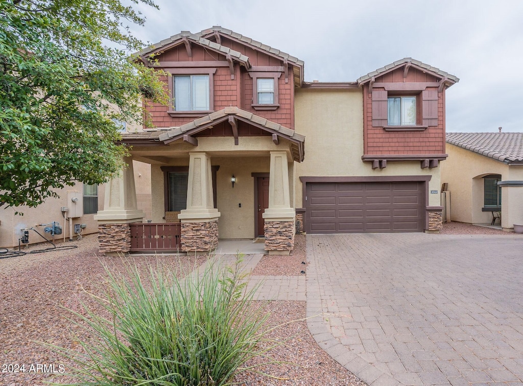 craftsman house with a garage