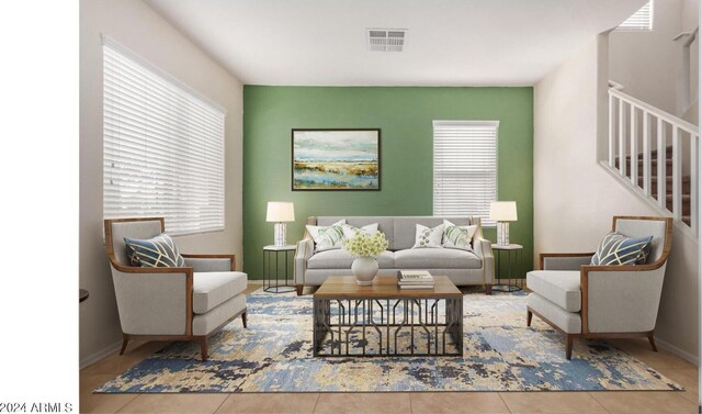 living room with tile patterned floors