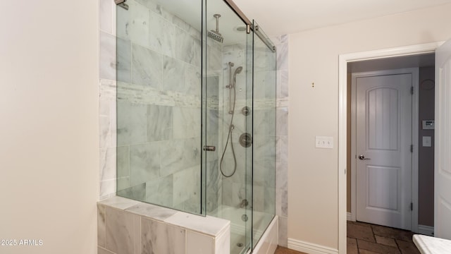 524 W Fairway Dr Unit 10, Mesa, AZ 85201 - bathroom featuring baseboards and stone tile flooring