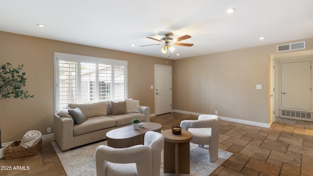 524 W Fairway Dr Unit 10, Mesa, AZ 85201 - living area with a ceiling fan, baseboards, recessed lighting, and stone tile floors