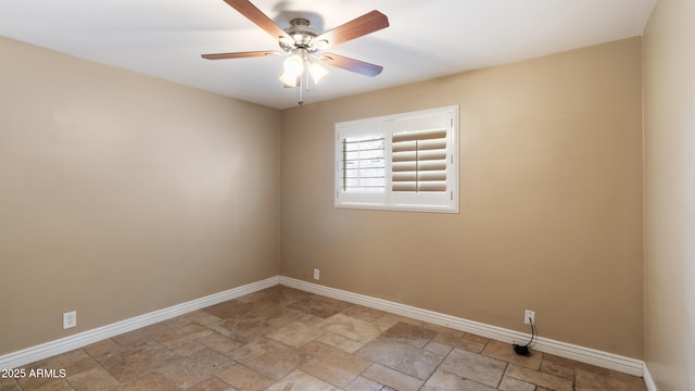 524 W Fairway Dr Unit 10, Mesa, AZ 85201 - spare room with baseboards, a ceiling fan, and stone tile flooring
