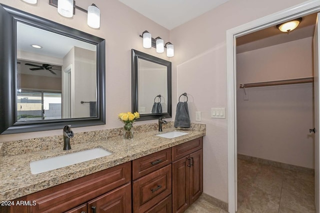 bathroom with vanity, tile patterned floors, and ceiling fan