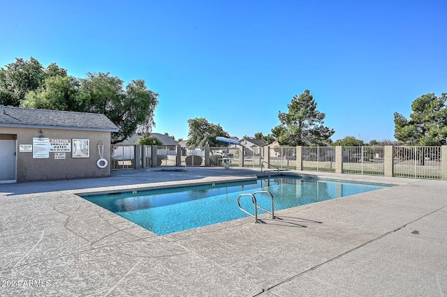 view of pool with a patio area