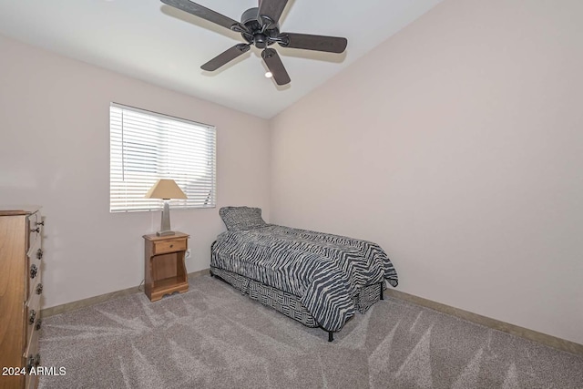 carpeted bedroom featuring vaulted ceiling and ceiling fan