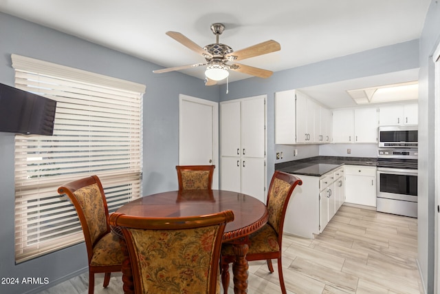 dining area featuring ceiling fan