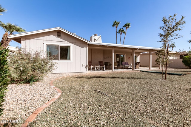 rear view of property with a patio