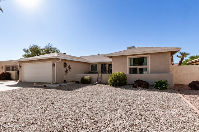 ranch-style house with a garage