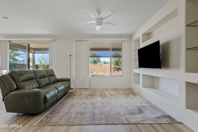 unfurnished living room featuring light hardwood / wood-style floors and a healthy amount of sunlight