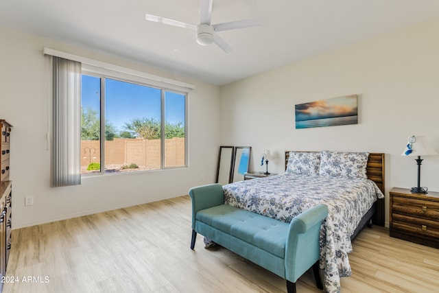 bedroom featuring light hardwood / wood-style flooring and ceiling fan