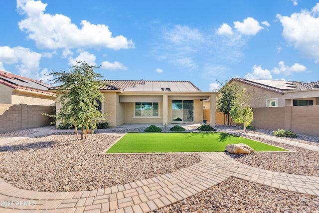 rear view of house featuring a patio area