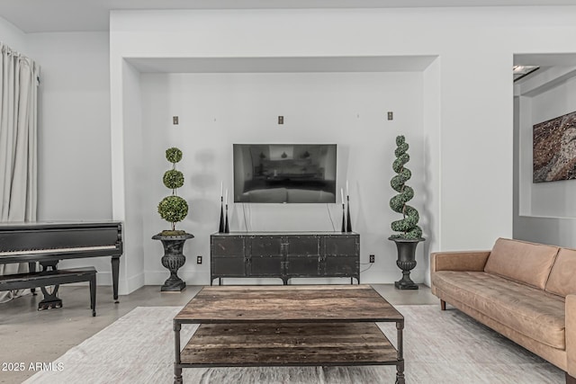 living room featuring baseboards