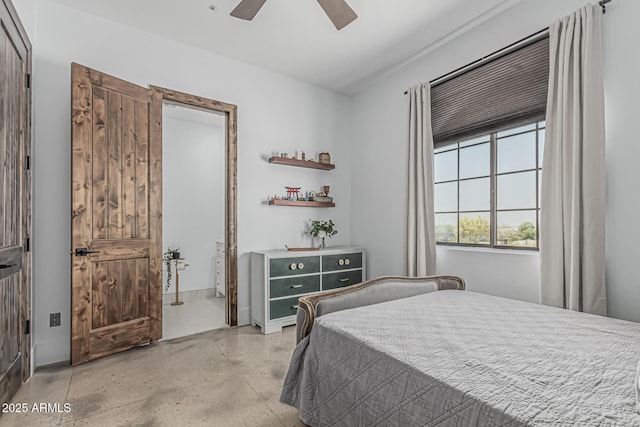 bedroom featuring ceiling fan and concrete floors