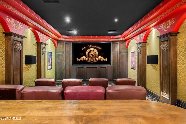 home theater room featuring ornate columns