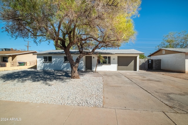 ranch-style house with a garage