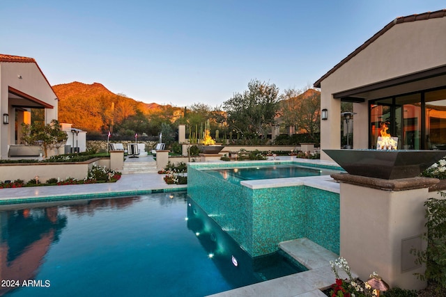 view of pool with a mountain view