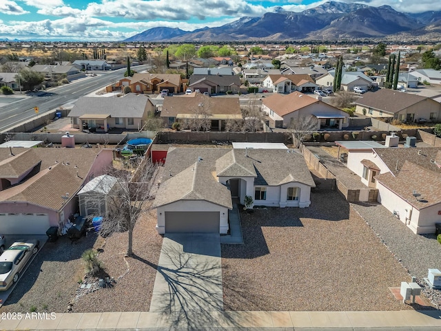 bird's eye view with a mountain view and a residential view