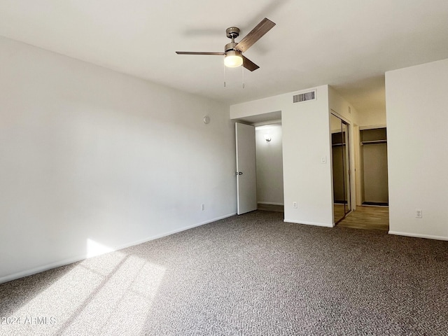 unfurnished bedroom with carpet floors, a closet, and ceiling fan