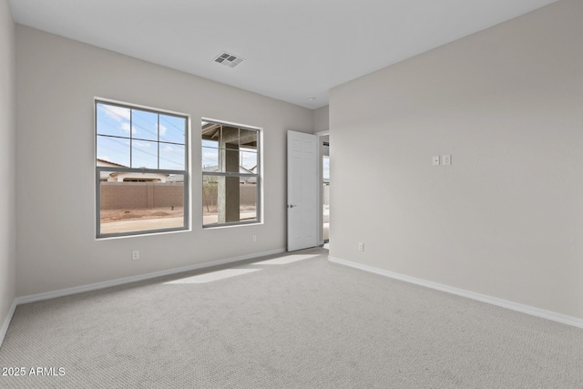 12311 W Parkway Ln, Avondale, AZ 85323 - empty room featuring carpet and baseboards