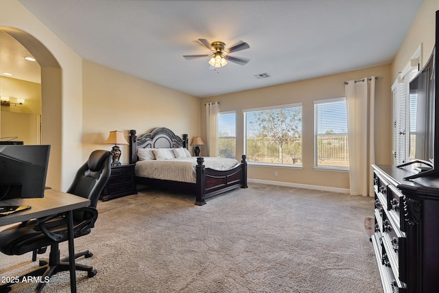 carpeted bedroom with ceiling fan