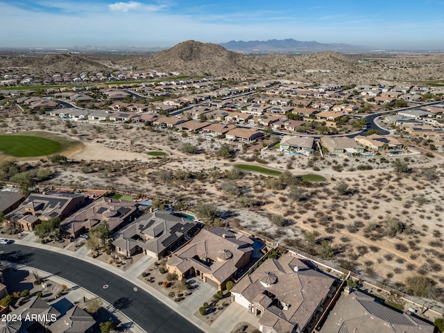 birds eye view of property featuring a mountain view