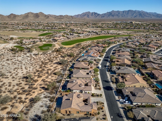 birds eye view of property featuring a mountain view