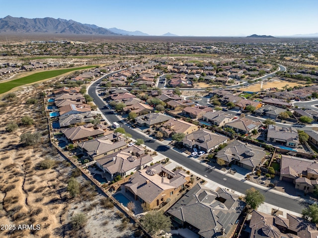 drone / aerial view featuring a mountain view