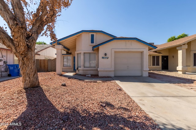 single story home with a garage