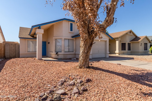 single story home with a garage