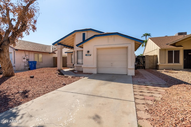 single story home featuring a garage