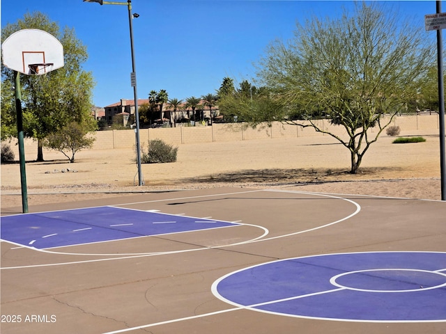 view of sport court featuring community basketball court and fence