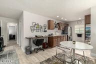 dining room featuring light wood-type flooring