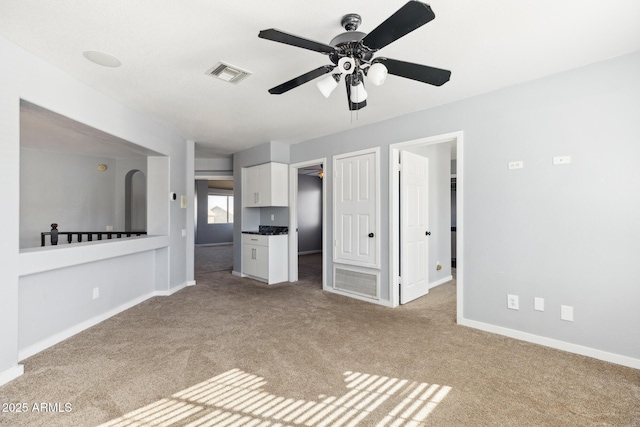 3641 E Park Ave, Phoenix, AZ 85044 - unfurnished living room featuring carpet, a ceiling fan, and baseboards