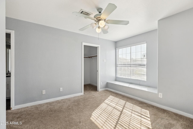3641 E Park Ave, Phoenix, AZ 85044 - unfurnished bedroom featuring carpet flooring, baseboards, a spacious closet, and ceiling fan