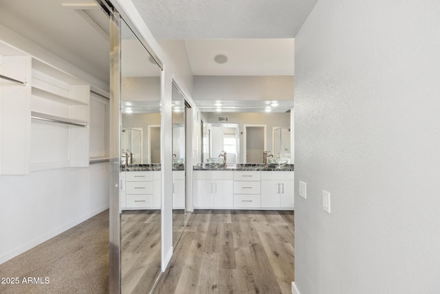3641 E Park Ave, Phoenix, AZ 85044 - full bath featuring vanity, wood finished floors, and baseboards
