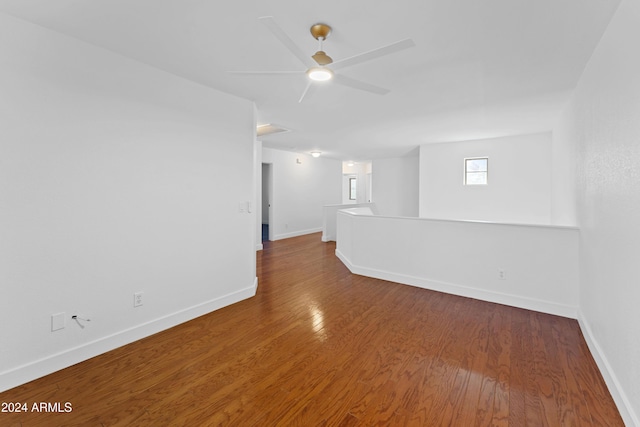 empty room featuring hardwood / wood-style floors and ceiling fan