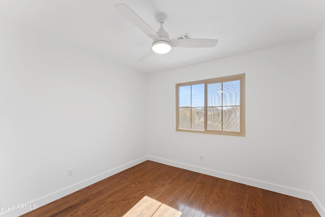 unfurnished room featuring ceiling fan and wood-type flooring