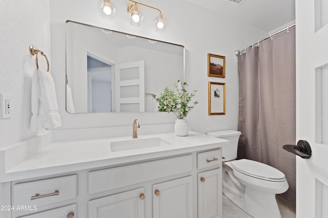 bathroom with a shower with curtain, tile patterned flooring, vanity, and toilet