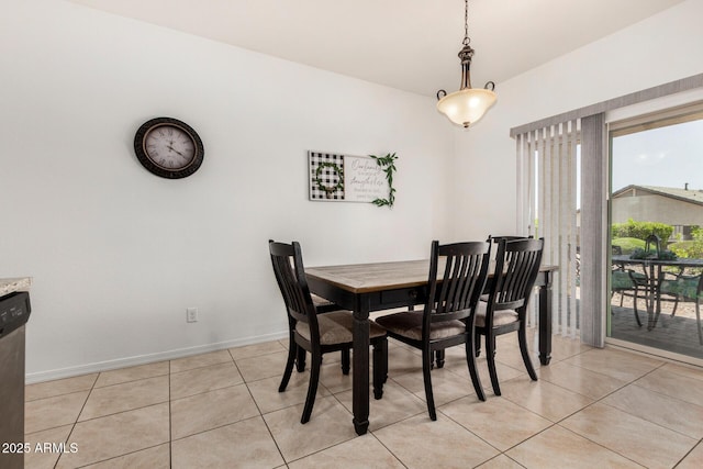 22403 W Harrison St, Buckeye, AZ 85326 - dining space featuring light tile patterned floors and baseboards