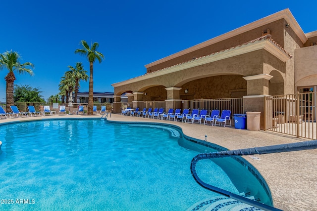22403 W Harrison St, Buckeye, AZ 85326 - community pool featuring a patio area