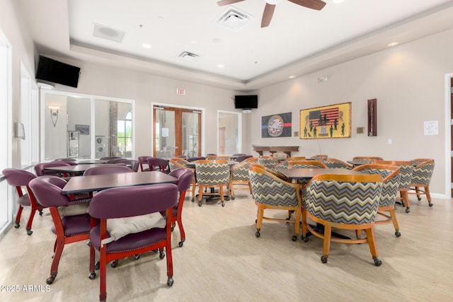 22403 W Harrison St, Buckeye, AZ 85326 - dining area with a tray ceiling, ceiling fan, and recessed lighting