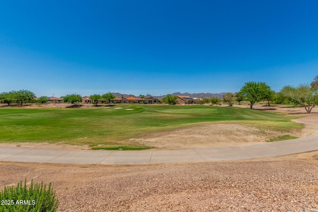 22403 W Harrison St, Buckeye, AZ 85326 - view of property's community featuring golf course view, a residential view, and a lawn