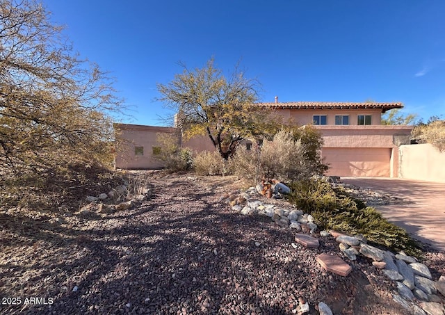 view of front of home with a garage