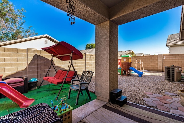 view of patio / terrace with a playground and central AC unit