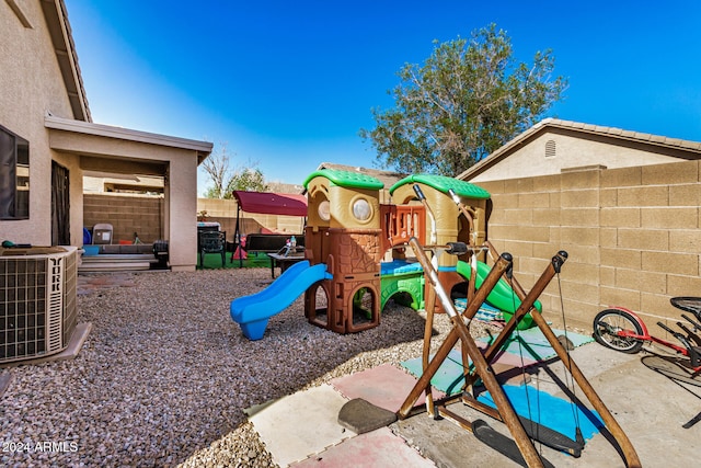 view of play area with cooling unit