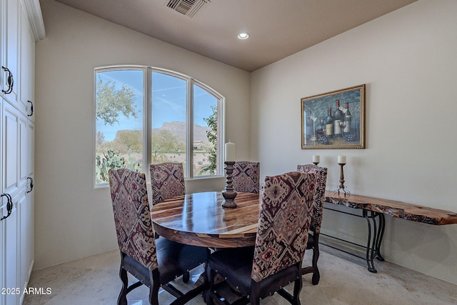 dining space featuring visible vents and recessed lighting