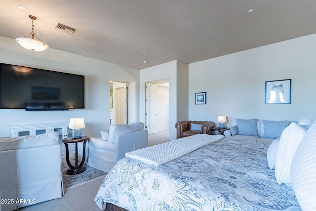 bedroom with carpet floors and visible vents