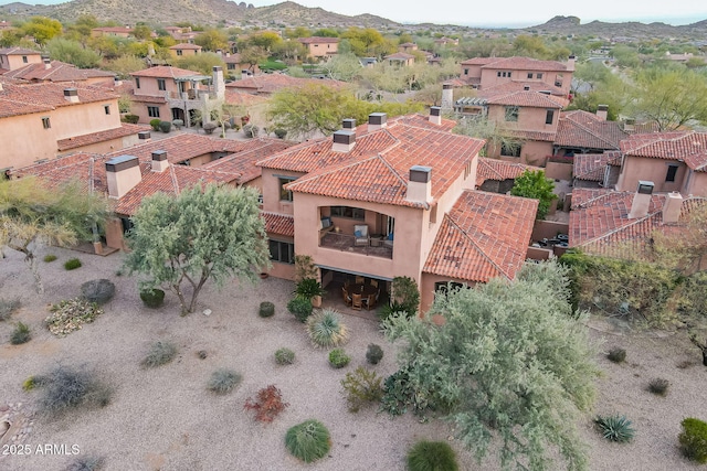 birds eye view of property featuring a residential view and a mountain view