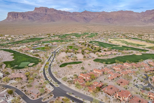 aerial view with a mountain view and golf course view