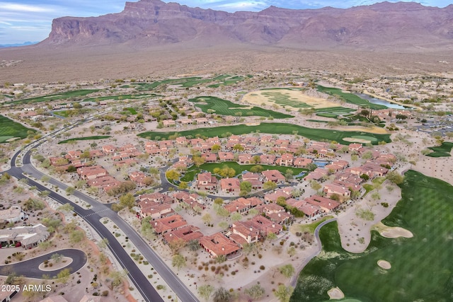 aerial view with golf course view, a residential view, and a mountain view