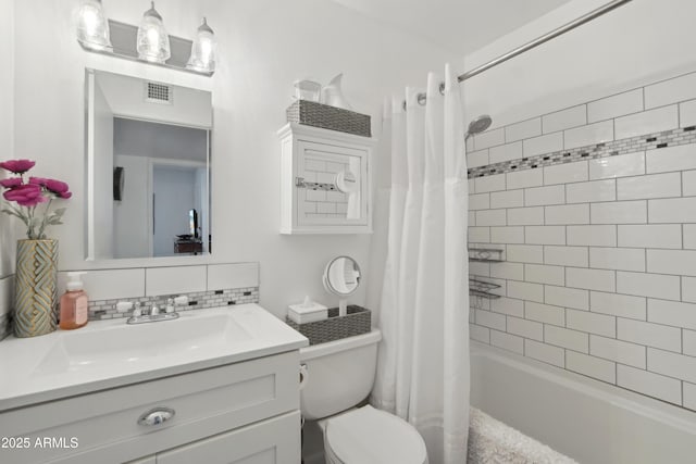 full bath featuring toilet, vanity, visible vents, backsplash, and shower / bathtub combination with curtain